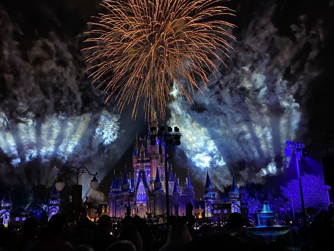Fireworks exploding over the Magic Kingdom castle.
