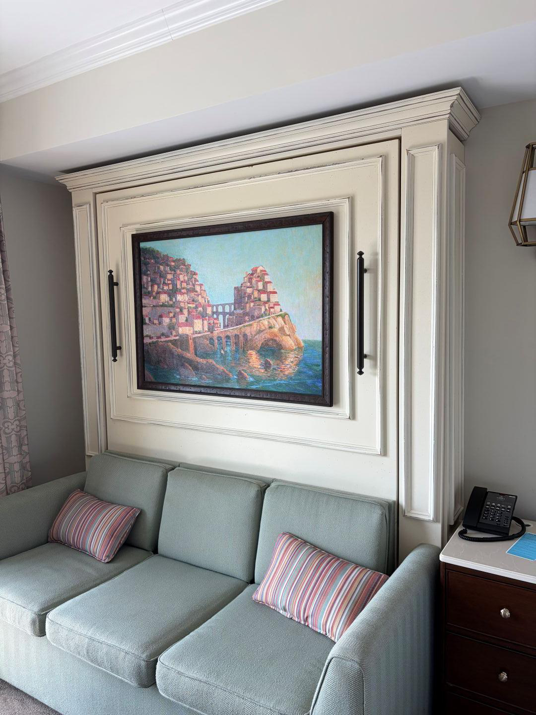 Couch with a pull out murphy bed above it