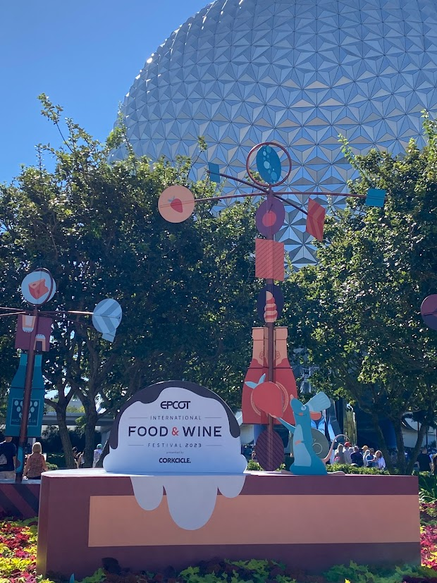 A picture of the welcome sign for the food and wine festival at Epcot