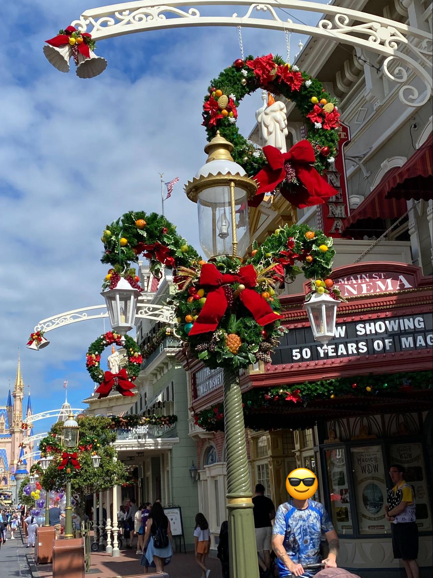 A photo of a wreath designed to look like the mickey mouse symbol